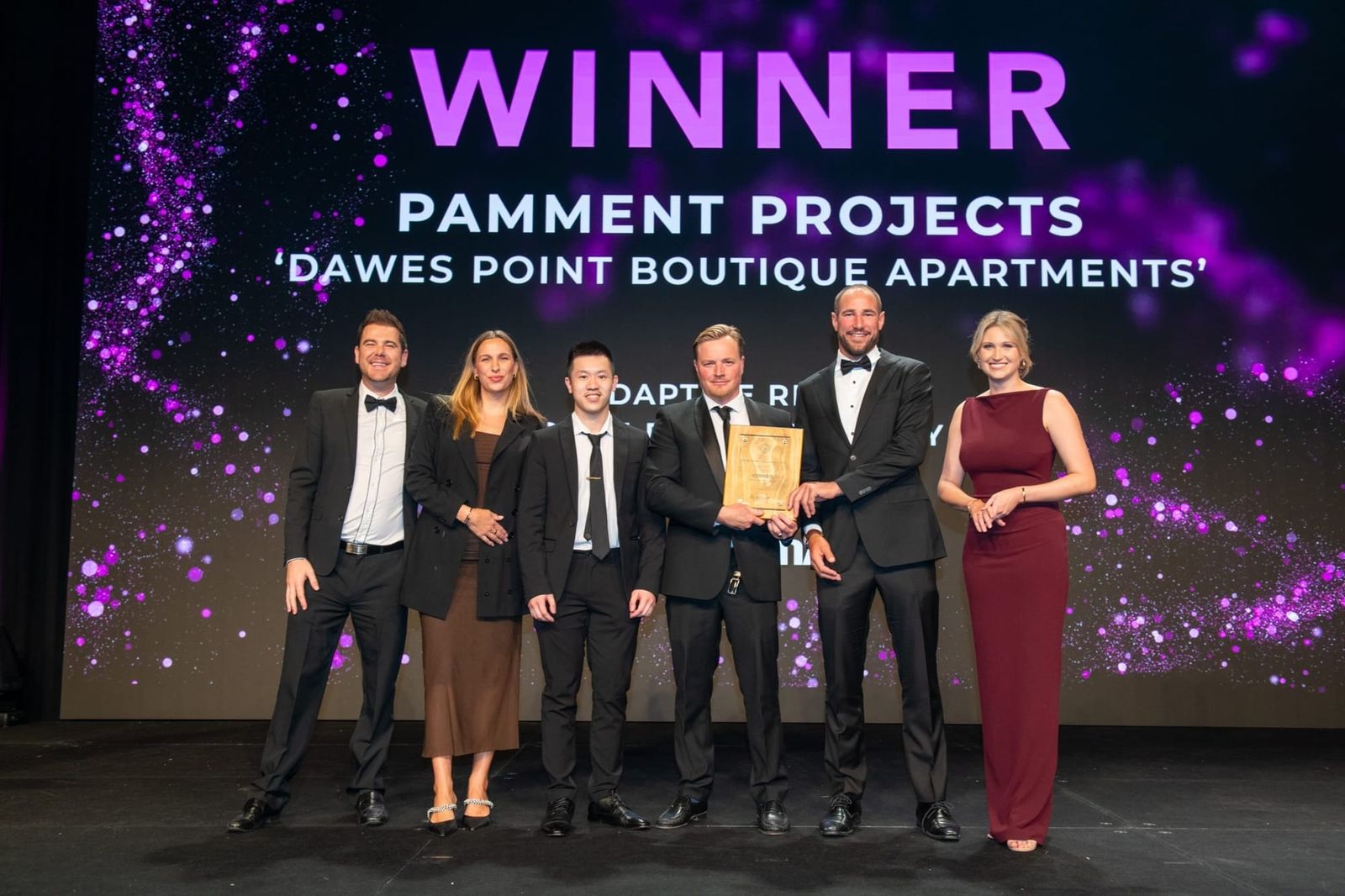The Pamment Projects team accepting a Master Builders Association award